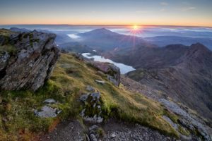 An amazing sunrise over the Snowdonia national park as view from the summit of Snowdon on a cold Octobers morning.