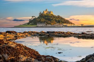 View of Mounts Bay and St Michael's Mount island in Cornwall at sunset